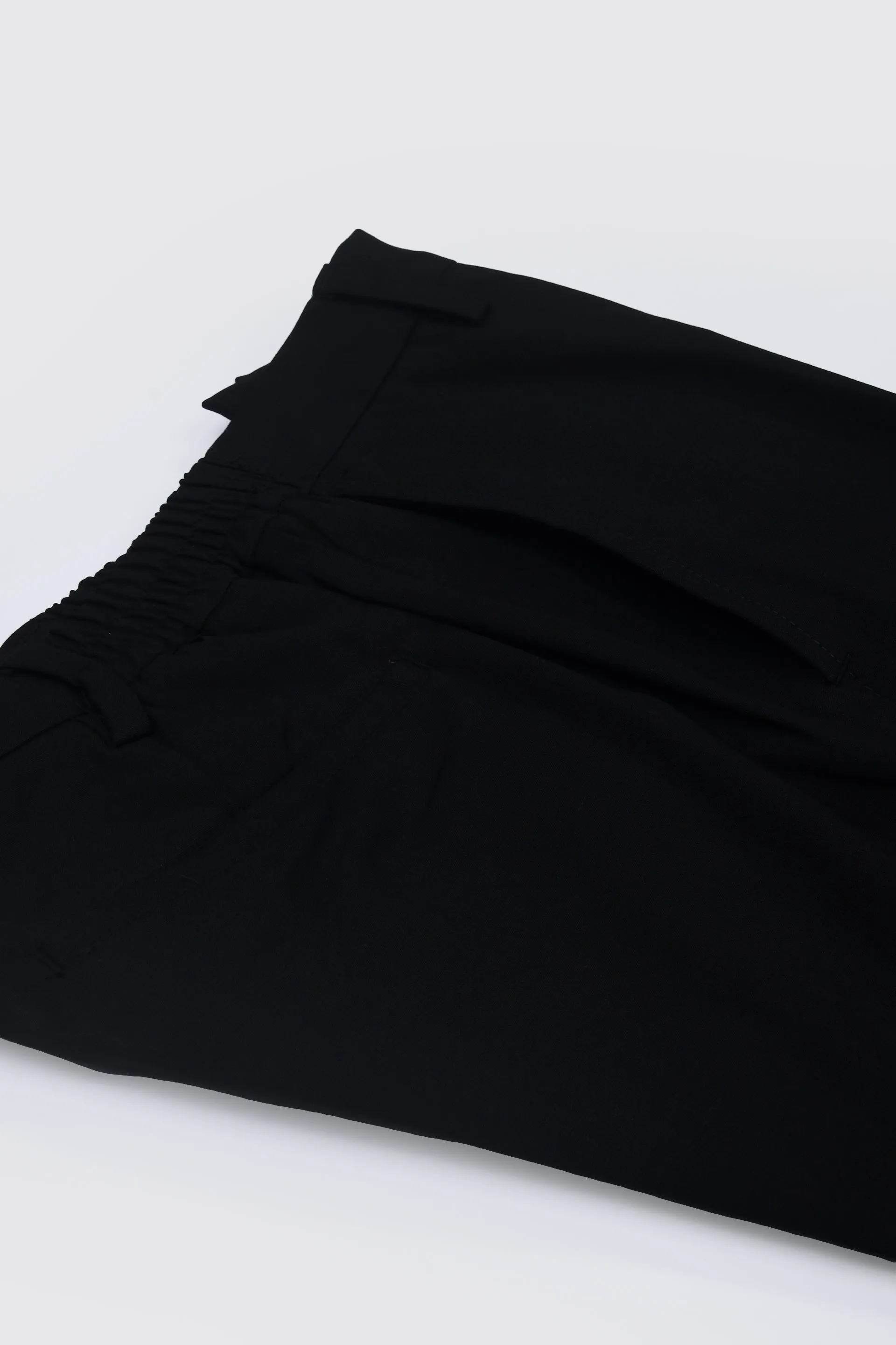 SOFT IRON RELAXED TROUSERS IN BLACK