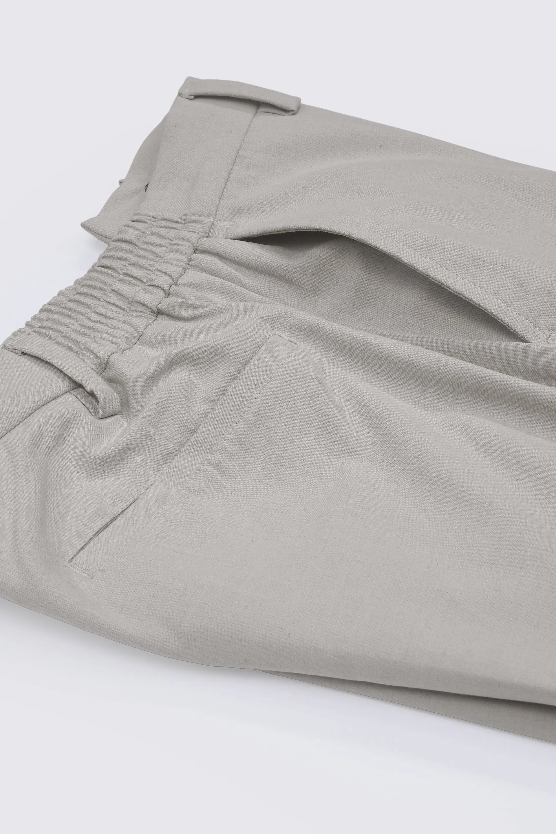 SOFT IRON TAILORED TROUSERS IN CREAM