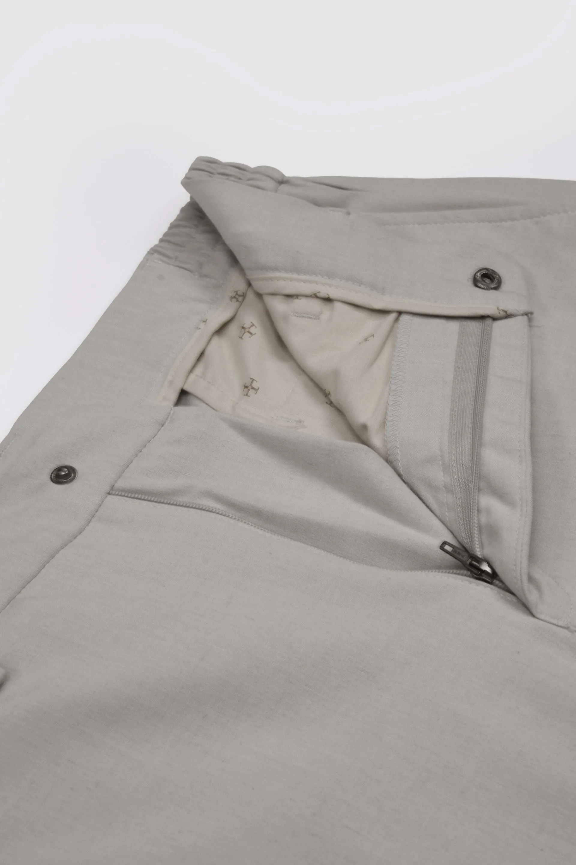 SOFT IRON TAILORED TROUSERS IN CREAM