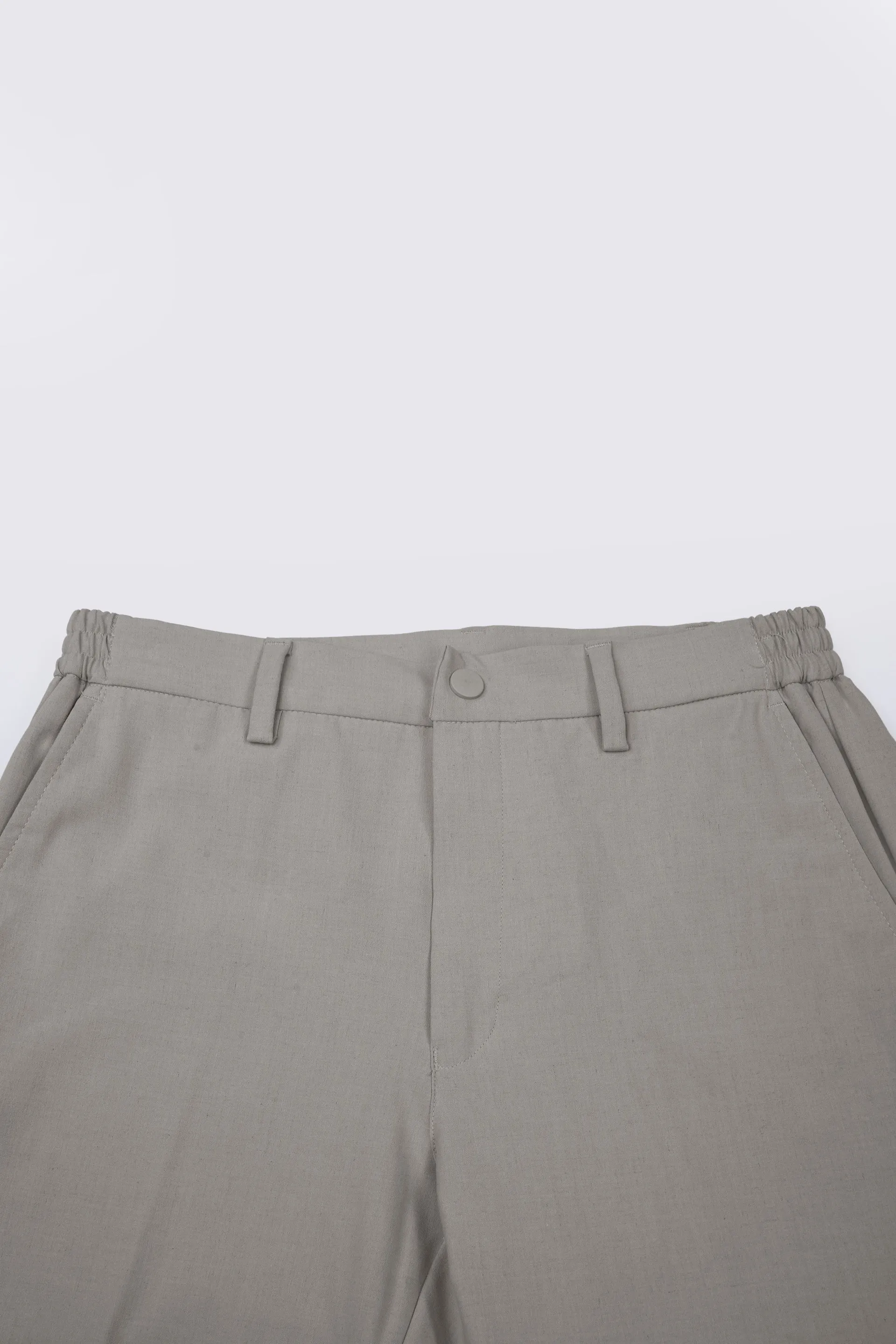 SOFT IRON TAILORED TROUSERS IN CREAM