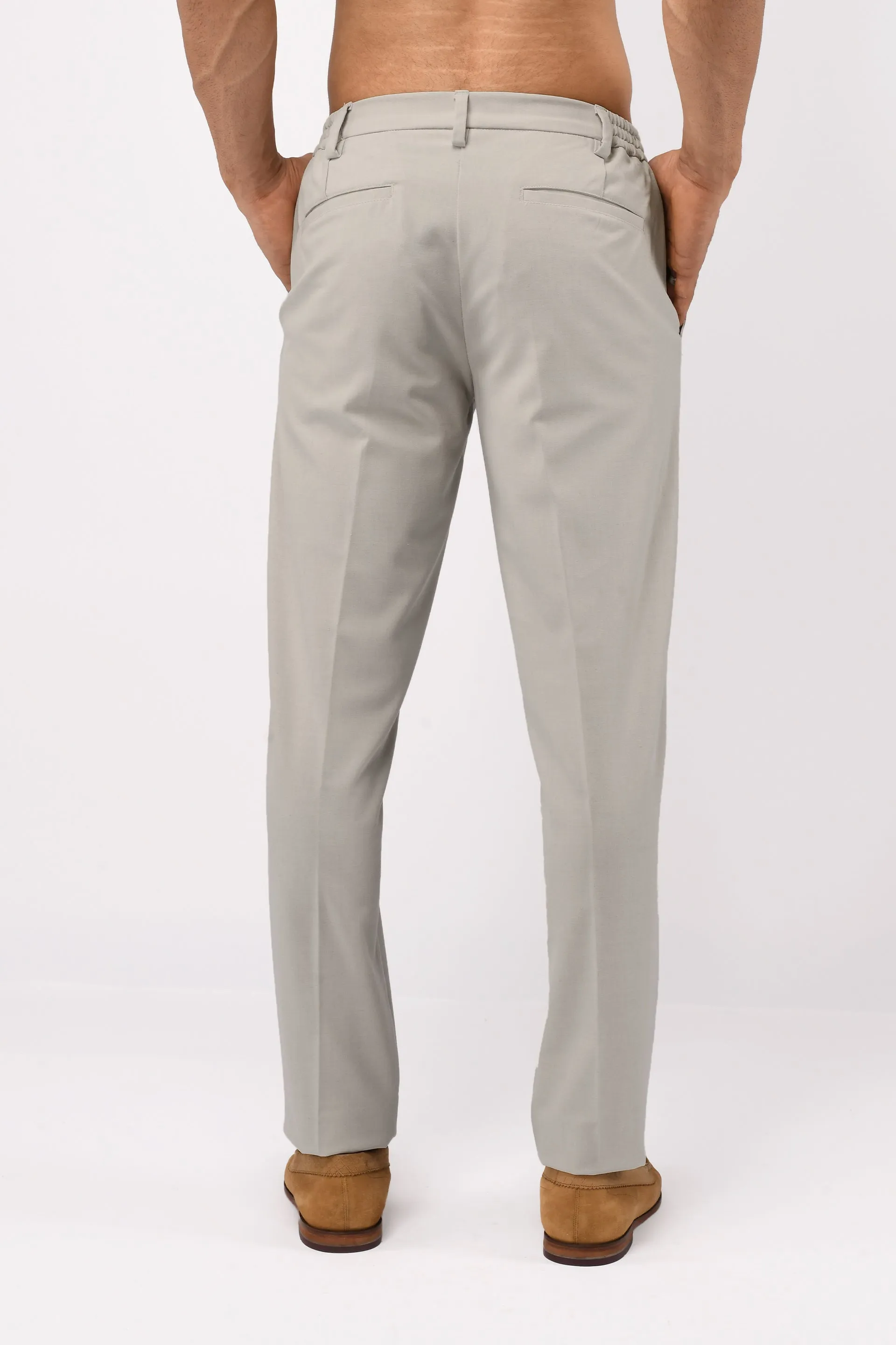 SOFT IRON TAILORED TROUSERS IN CREAM
