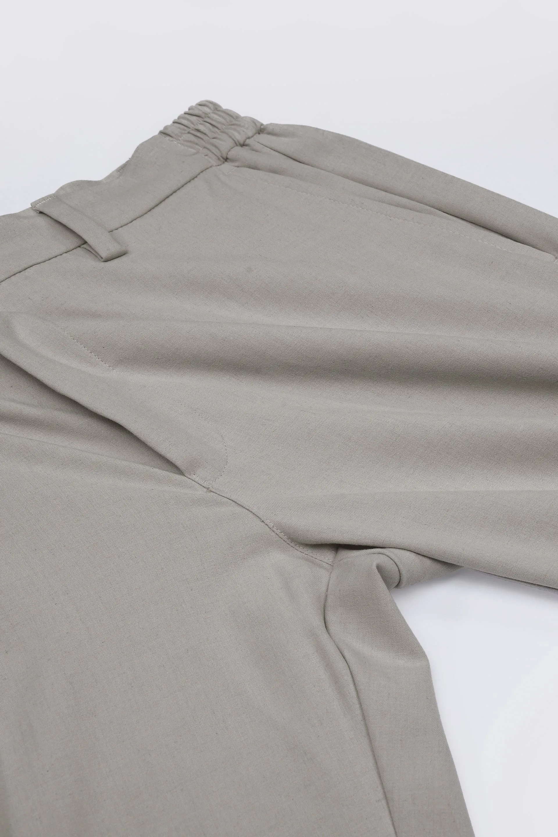 SOFT IRON TAILORED TROUSERS IN CREAM
