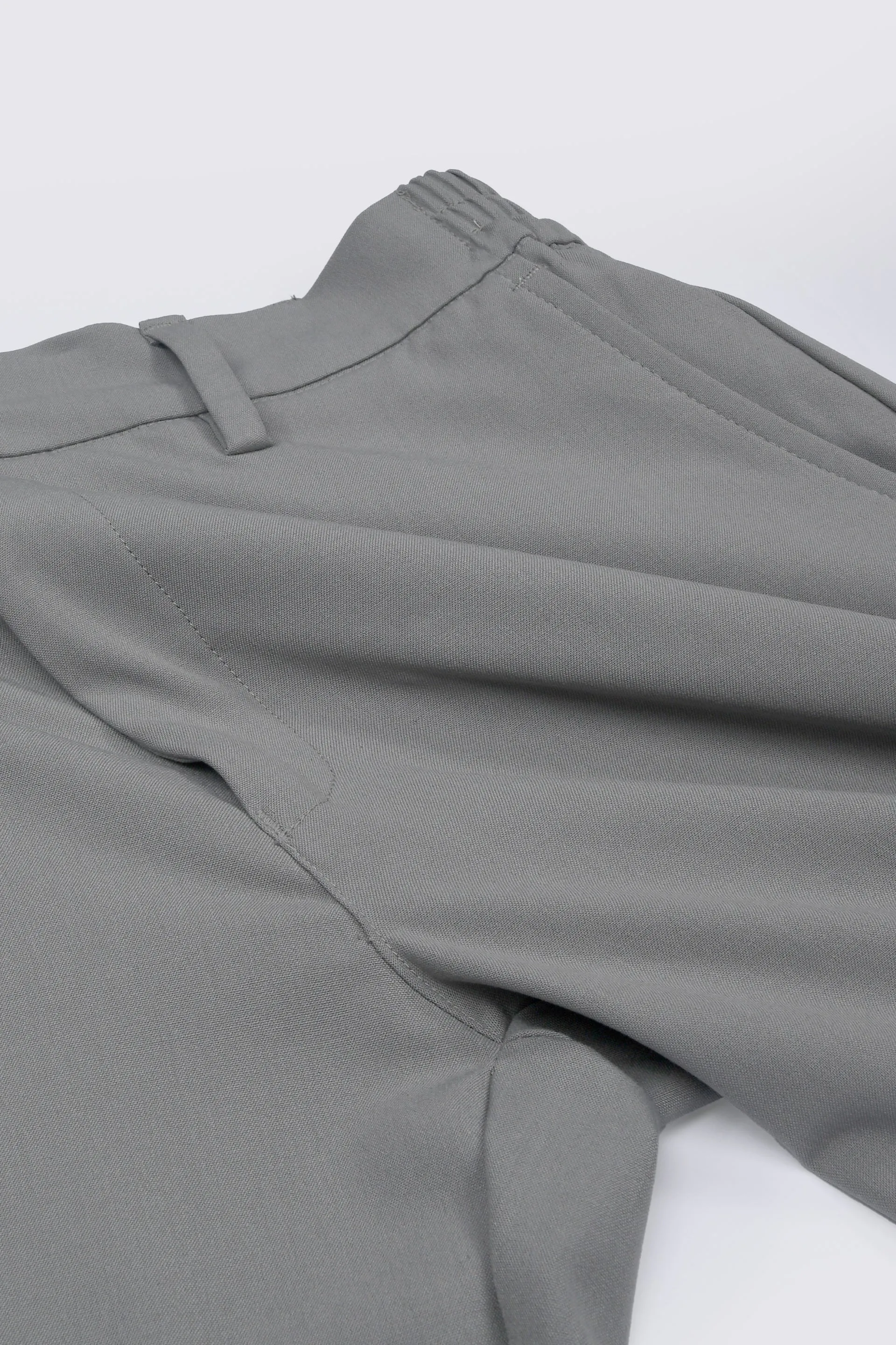 SOFT IRON TAILORED TROUSERS IN LIGHT GREY