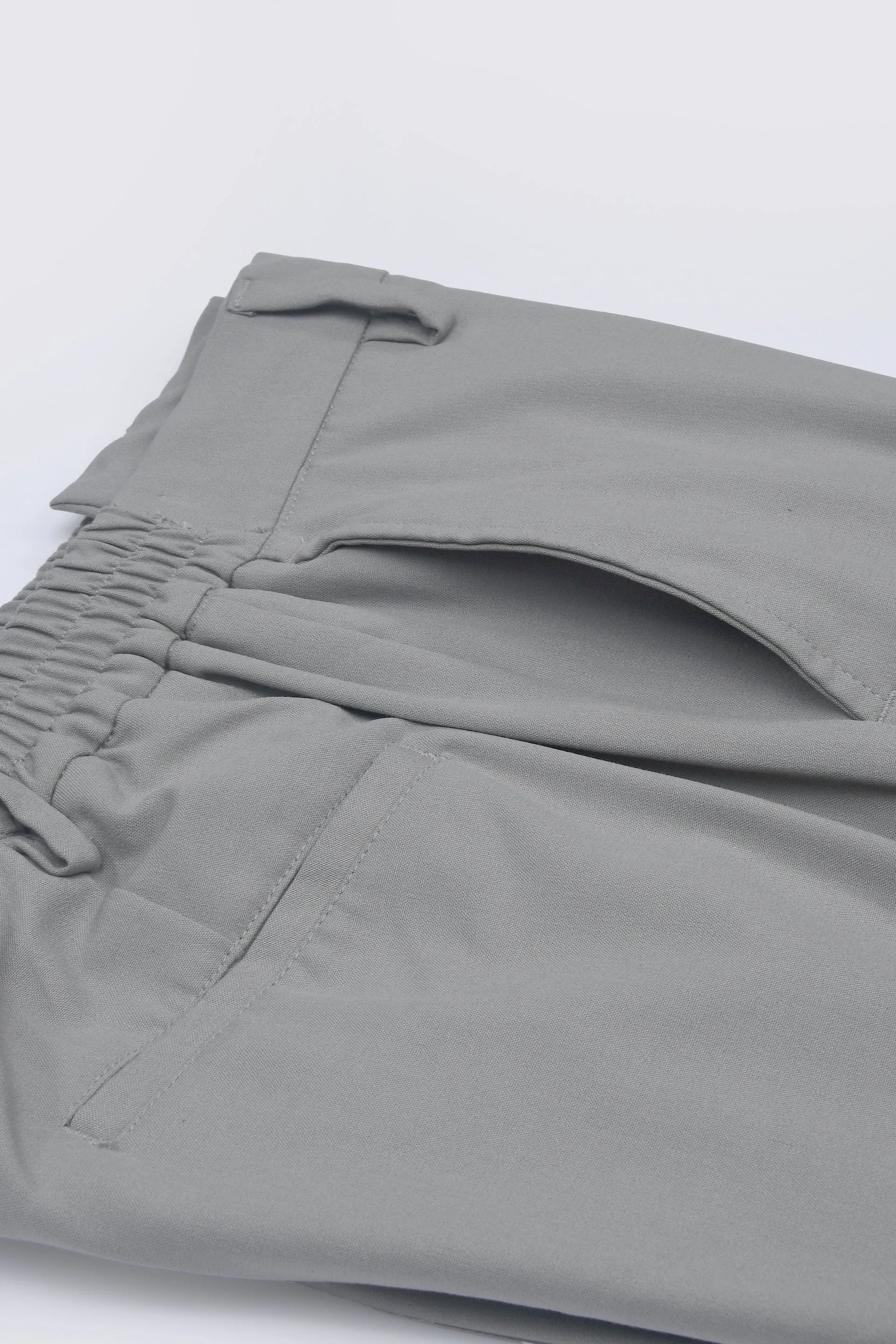 SOFT IRON TAILORED TROUSERS IN LIGHT GREY