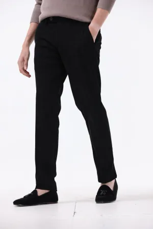 STATEMENT CORDUROY TROUSERS IN BLACK