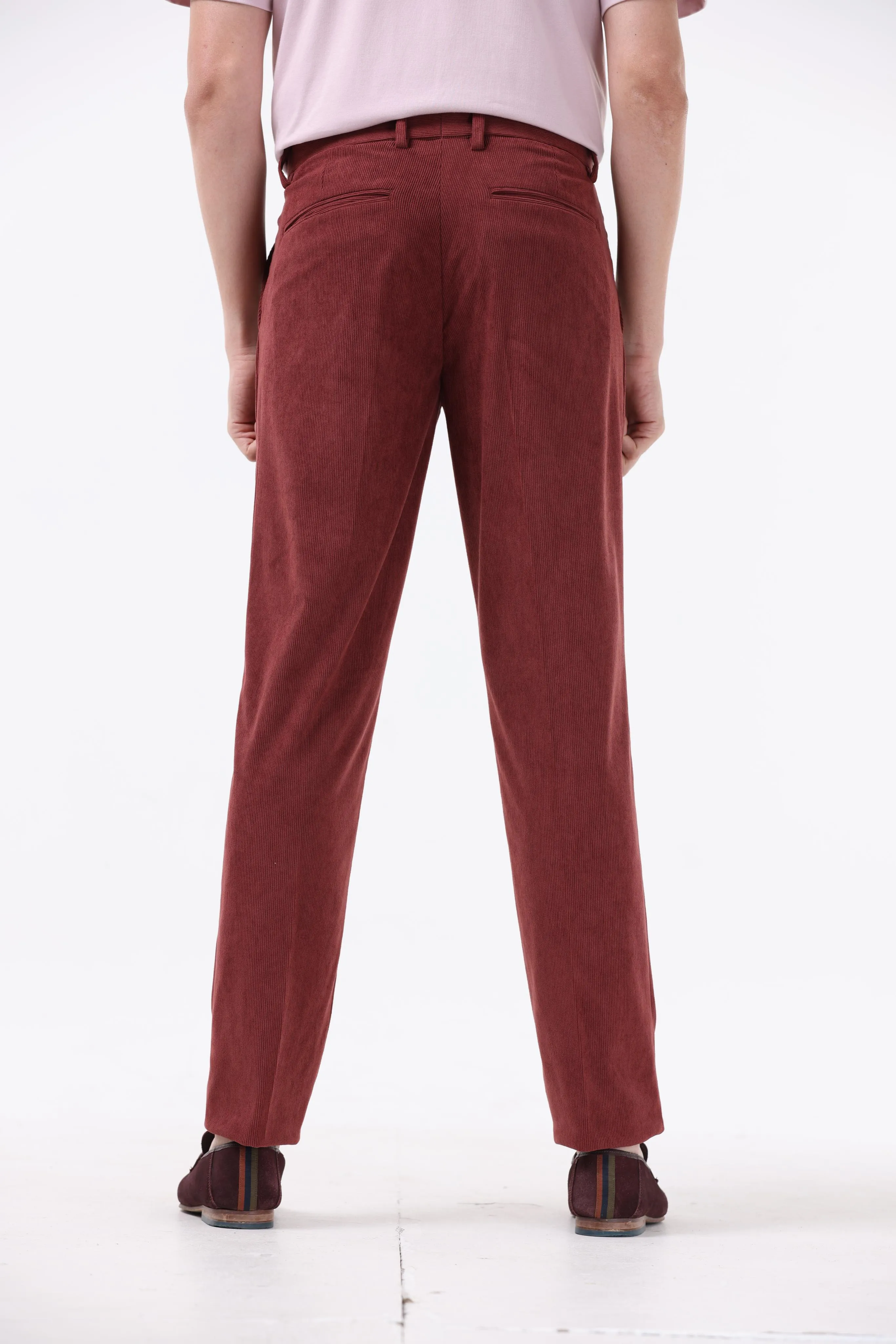 STATEMENT CORDUROY TROUSERS IN WINE