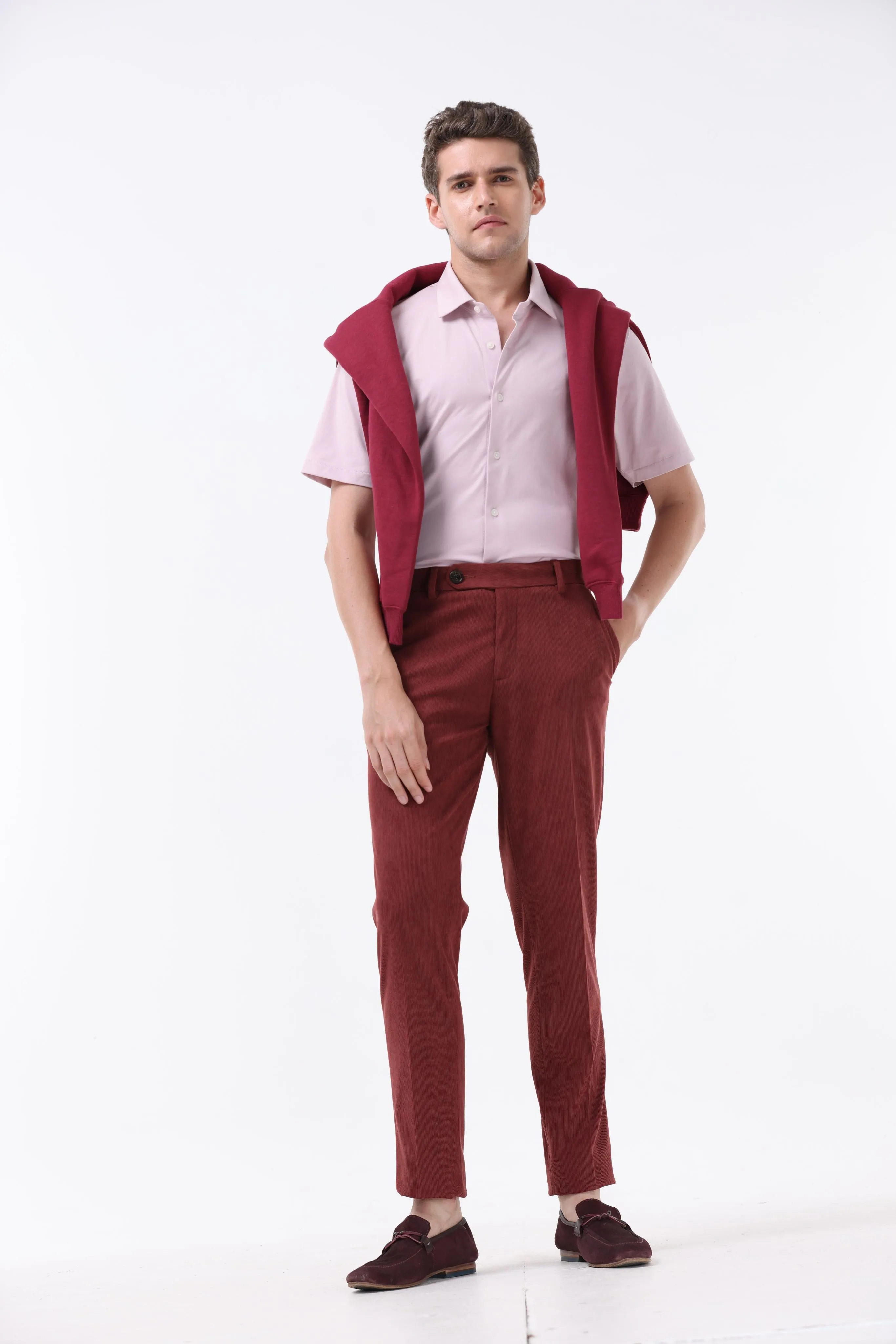 STATEMENT CORDUROY TROUSERS IN WINE
