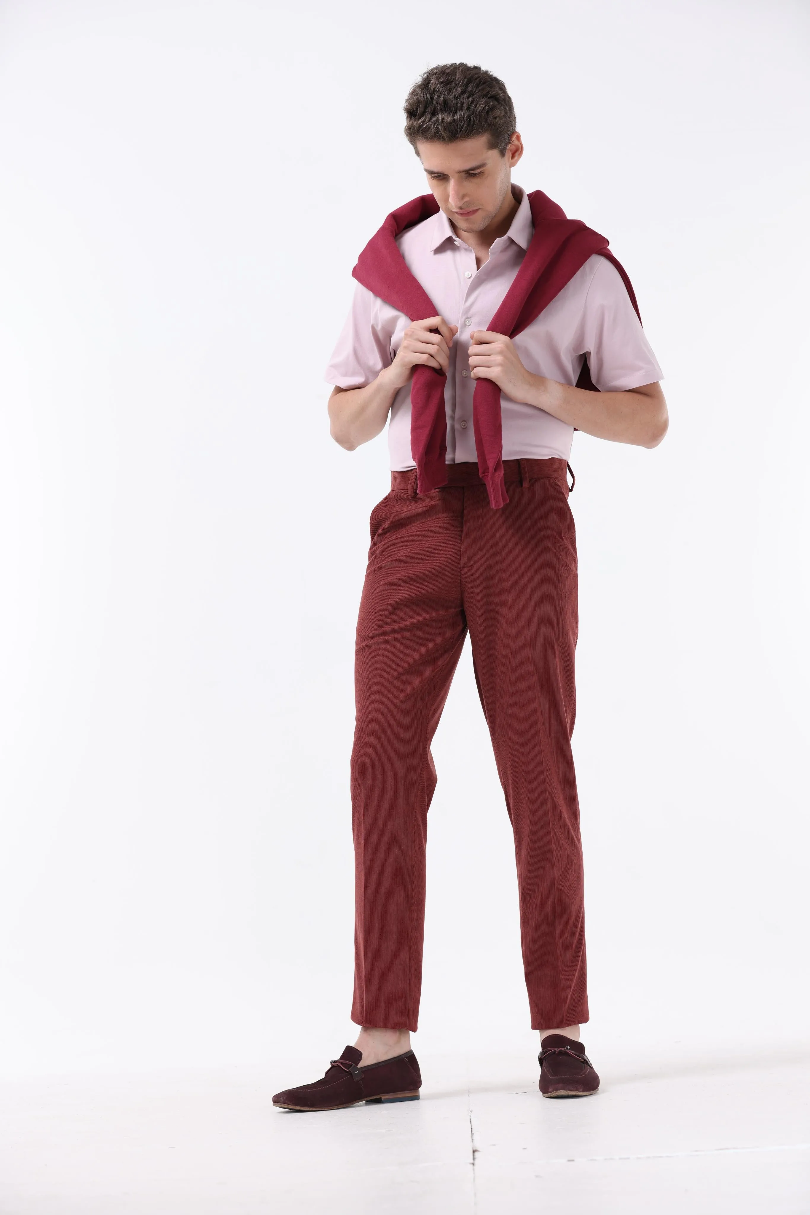 STATEMENT CORDUROY TROUSERS IN WINE