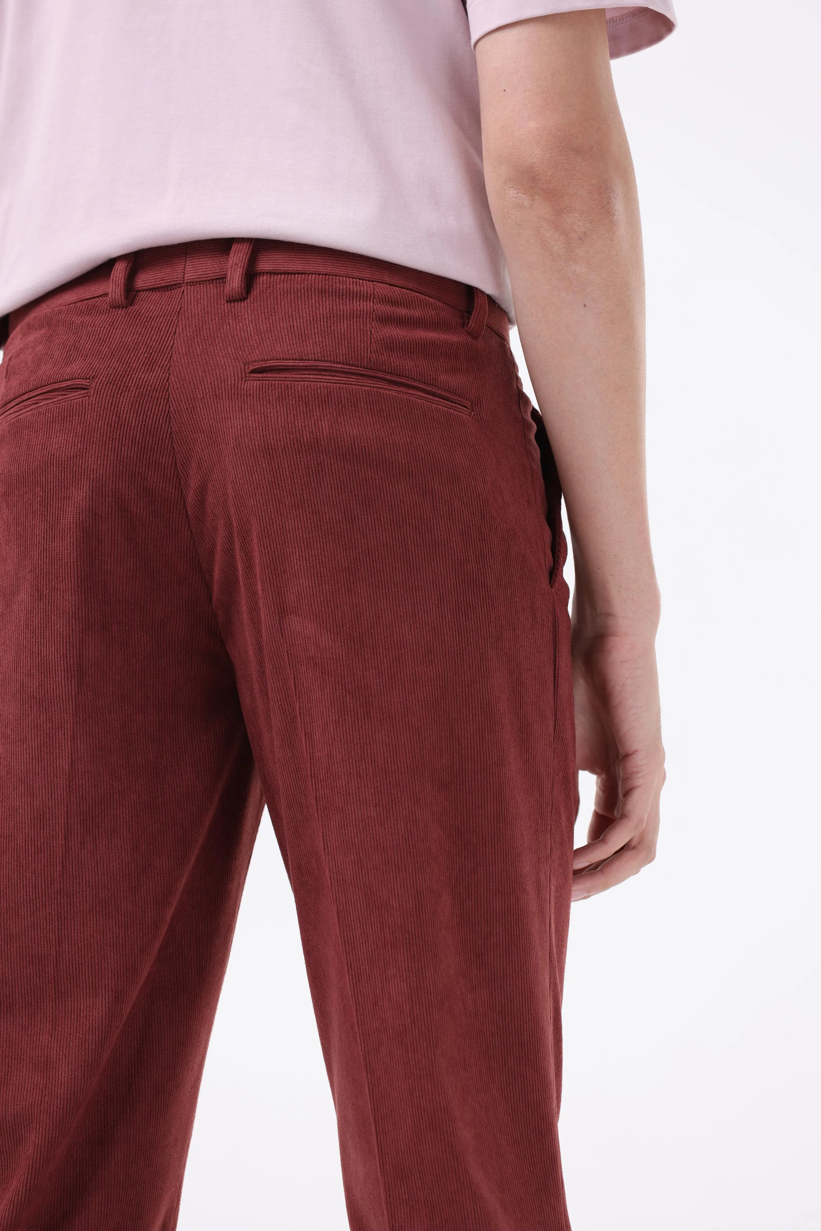 STATEMENT CORDUROY TROUSERS IN WINE